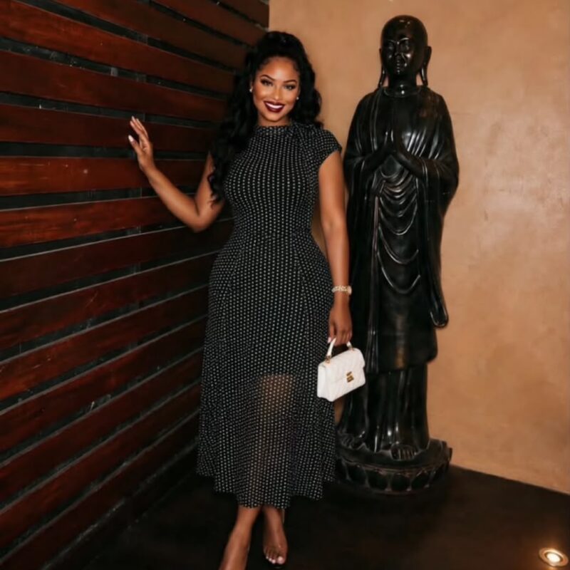 Classic Black Polka Dot Sheer-Hem Midi Dress – High-Neck Sleeveless Fitted Gown